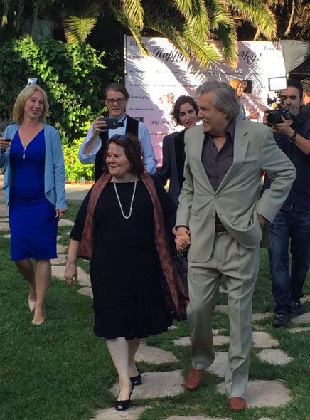 Oleg Vidov and guests in a garden